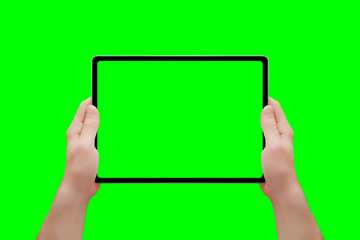 Tablet mockup in man hands isolated in chroma key green. Front position. Close-up