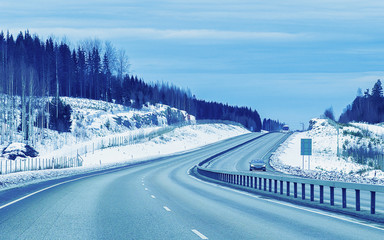 Canvas Print - Car on Winter road with snow in Finland reflex