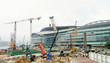 © Roman Babakin - Construction site with workers in center of Hong Kong
