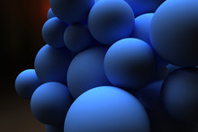 Blue Balls Of Different Sizes On A Dark Background