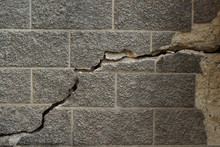 Large Crack In The Wall Of The House