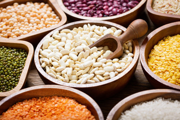 Wall Mural - bowls of legumes, lentils, chickpeas, rice and beans