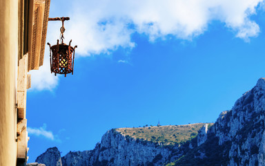 Sticker - Street lamp and mountains and blue sky in Capri reflex