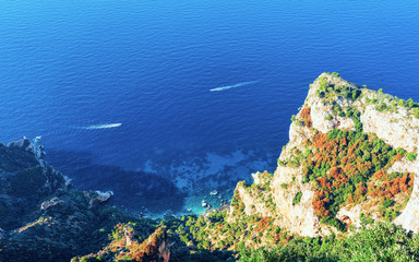 Wall Mural - Capri Island and Blue Mediterranean Sea near Naples of Italy reflex