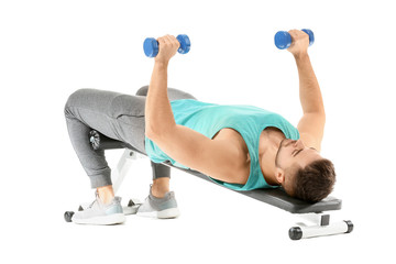 Sticker - Sporty young man training with dumbbells on white background