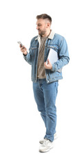 Canvas Print - Young man with laptop and mobile phone on white background