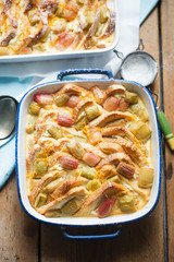 Wall Mural - Rhubarb & ricotta bread & butter pudding with icing sugar 