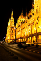 Wall Mural - Night view of the illuminated building of the hungarian parliament in budapest.