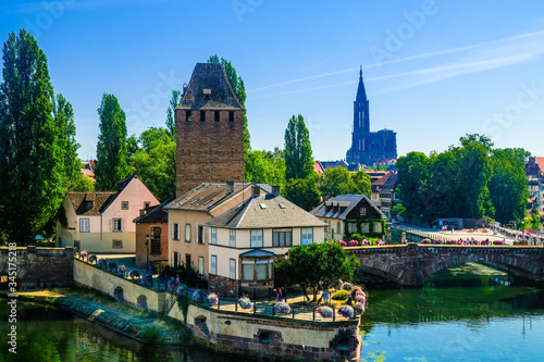 Strasbourg, France, Alsace. The Ill river, the Petite France quater and the cathedral in the distance.