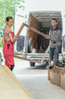 © ElitProd - Carpenters unload their van in the workshop