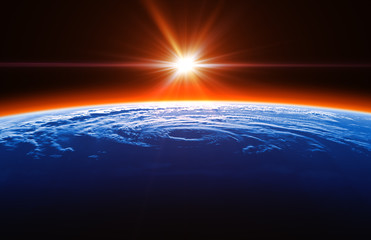 Wall Mural - beautiful sunrise on the background of big hurricane