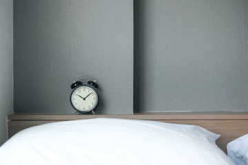 Alarm clock on grey background with copy space for you design.