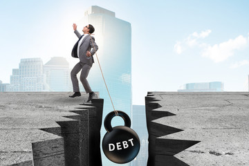 Concept of debt and load with businessman