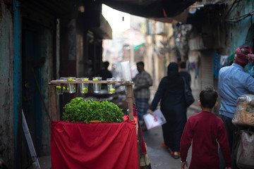 A local street stall selling lemon and mint juice in the street in a summer morning. Indian lifestyle and street.