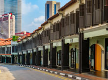 Traditional Archway Arcade In A Street In Singapore Chinatown With Colonial Shop Houses