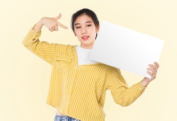 young asian woman excited expression and holding blank paper , advertising banner