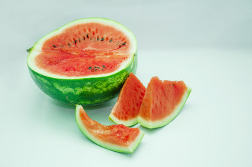 slices of watermelon on a light background, watermelon