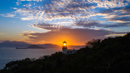 Poster - Lighthouse of Victoria Harbour at dusk