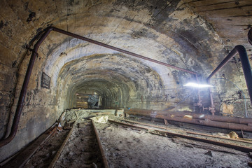 Underground old abandoned iron mine tunnel 