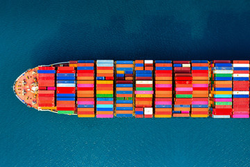 Wall Mural - Aerial view of container cargo ship in sea.