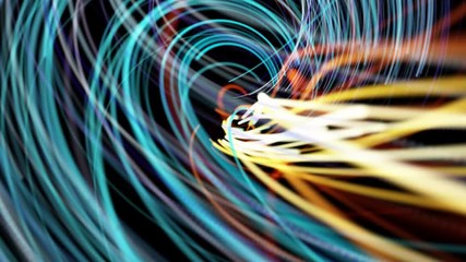 Color wires on a black background. Fiber optic cables concept animation.  Fast dynamic technology data