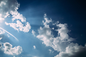sun and white cloud with blue sky background