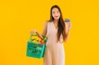 © siraphol - Portrait beautiful young asian woman with grocery basket shopping bag