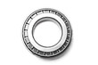 Single row tapered roller bearing made of shiny metal is designed to absorb radial and one-sided axial loads of a vehicle. Spare part for sale or repair in a workshop or car service.
