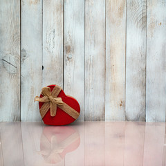 Gift box on the wooden floor