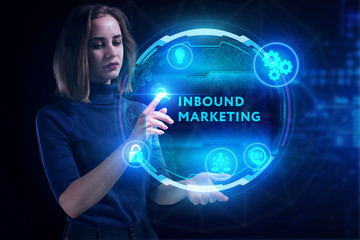 Business, Technology, Internet and network concept. Young businessman working on a virtual screen of the future and sees the inscription: Inbound marketing