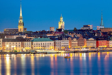 Wall Mural - Stockholm. City embankment at sunset.