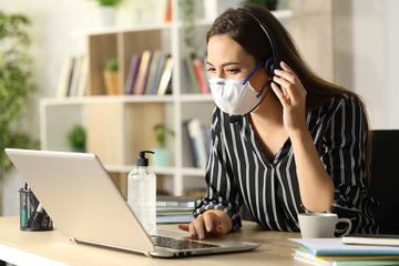 Happy telemarketer avoiding coronavirus working at homeoffice