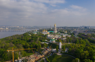 Wall Mural - Aerial view of Kiev Pechersk Lavra illuminated by the sunset rays of the sun, Kyiv, Ukraine