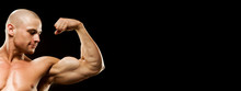 Close-up Of A Power Fitness Man's Hand. Muscular Bodybuilder Flexing And Showing His Biceps - Internal Side - On Black Background. Studio Shot