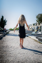 Girl With Long Hair In The Cemetery