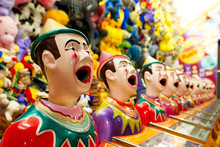 Close Up Of Laughing Clowns At The Fairground