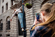 © Wavebreak Media - Rear view of girl taking her friend in photo