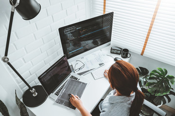 Wall Mural - developing programmer development website design and coding technologies working at home