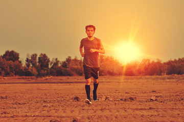 Wall Mural - Blurry subject Man running on road sport free run