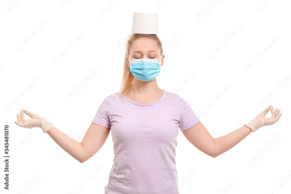 Meditating woman with toilet paper on white background. Concept of coronavirus epidemic