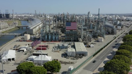 Poster - Oil Refinery with American Flags Aerial Approach Footage 4K Industrial Factory Made In America