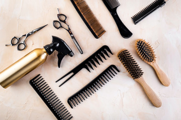 Poster - Hairdresser tools. Flat lay on beige background top view