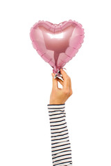 Wall Mural - Pink air balloon held by a hand on an isolated background. Concept wedding, valentines day, photo zone, lovers. Banner Flat lay, top view