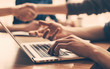 © yurolaitsalbert - close up. business team works sitting at the office Desk