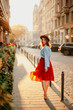 © Катя Іваськевич - young woman walking on the street in a dress