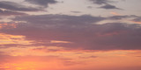 Fototapeta Zachód słońca - Dramatic sunset sky. Cloudy sky as a background.
