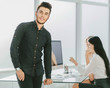 © yurolaitsalbert - young business man standing in his office