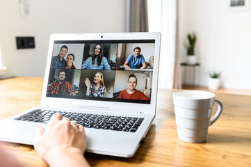 Using zoom app for distance video communication with coworkers, friends. People profiles on laptop desktop. Online meeting, webinars