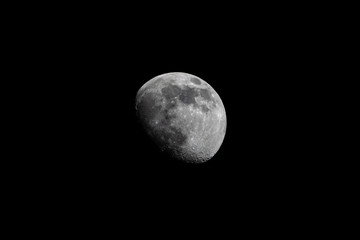 Wall Mural - growing phase moon in the dark sky