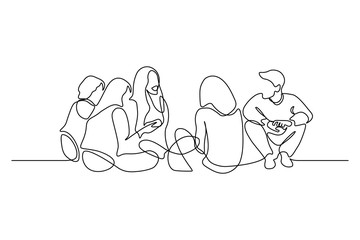 group of young people sitting on ground together and talking. friends rest and communicate. continuo